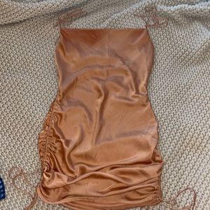 CAGE burnt orange mini dress